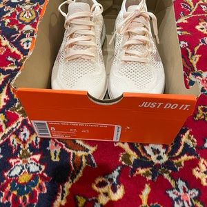 Brand new never worn, woman’s Nike free run fly knit sneakers